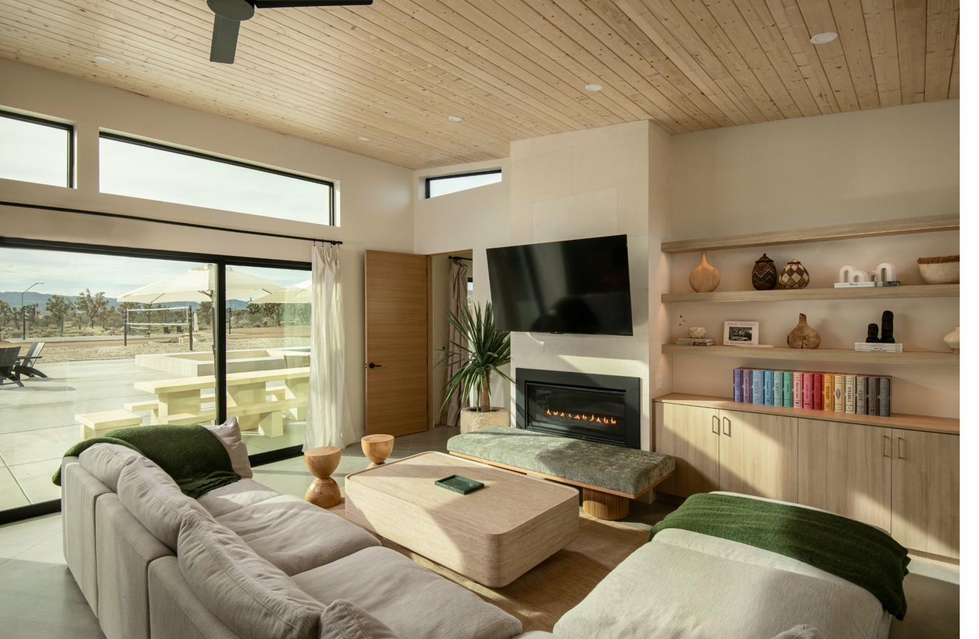 Living room with Joshua Tree view and fireplace
